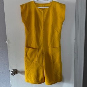 Homemade medium yellow romper with two front pockets